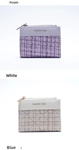 Detail showing lavender and white tweed wallets with top zipper and gold star accents