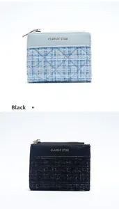 Detail of short wallets with quilted leather and CLASSIC STAR embossed texture