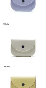 Vista verticale di portacarte minimalisti in pelle nei colori lavanda, bianco e giallo