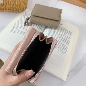 Mini portafogli in pelle a grana litchi con cerniere metalliche in rosa e kaki