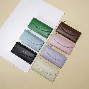 Portafoglio lungo da donna in pelle PU in sette colori con cerniera e patta classica