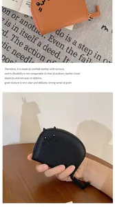 Detail eines süßen Katzen-Kartenhalters aus genarbtem Rindsleder mit Ohren-Applikation
