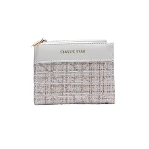 Petit portefeuille matelassé blanc pour femme avec panneau en tweed et zip doré