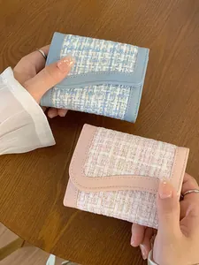 Portafogli minimalisti in tweed e pelle per donna nei colori azzurro e rosa confetto