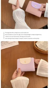 Detaillierte Makroansicht des Premium Leder mit Lychee-Muster und Gold-Druckknopf am Geldbeutel