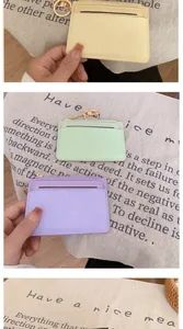 Detailed view of multi-slot card holders with zipper pocket and golden key ring