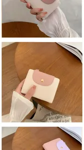 Details zur cremefarbenen und rosa Mini-Geldbörse aus Leder mit goldenem Druckknopf