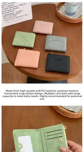 Detail of multi-compartment PU leather wallet interior with card slots and snap closure