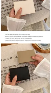 Detail of pebbled leather texture and stitching on small bi-fold wallets for women