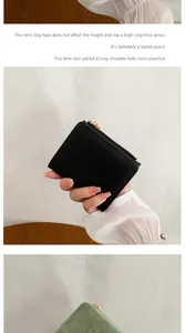Detail of short wallets in black and green with wrinkled texture and gold zippers