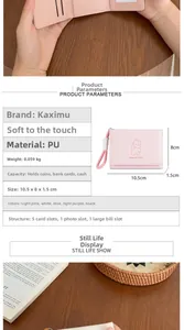 Detail view of pink PU leather wallet showing cute bear print and compact 3-fold interior
