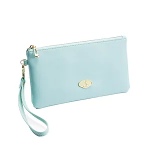 Elegant light blue long wallet for women with golden zipper and wristlet strap