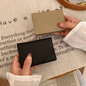 Short minimalist litchi grain PU leather wallets for women in khaki and black colors