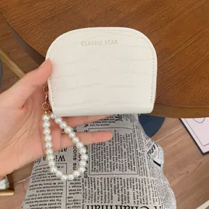 White crocodile pattern semi-circle card holder purse with elegant faux pearl wrist strap