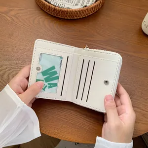 Minimalist white PU leather trifold wallet for women with rabbit pattern and card slots
