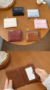 Detail of multi-color PU leather folding wallets with snap button and zipper pocket