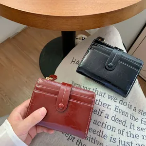 Portafogli corti vintage da donna in nero e marrone con eleganti cuciture bianche a vista