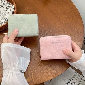 Kurze Reißverschluss-Geldbörse für Damen mit Classic Star Druck in Pastellgrün und Rosa