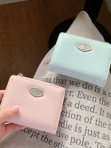 Women's minimalist pleated leather envelope wallet in pink and mint green colors