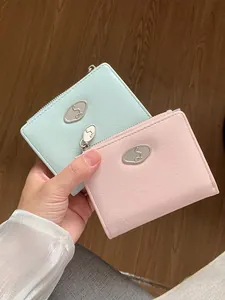 Minimalist wrinkled leather envelope wallets for women in pink and mint green colors