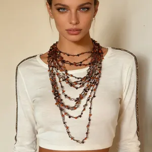 Bohemian multi-layer handmade beaded necklace with amber and bronze charms for women