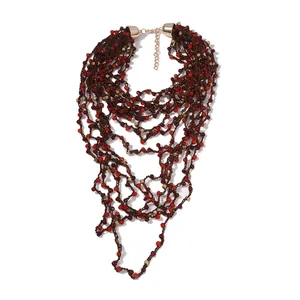 Bohemian multi-layer hand-woven beaded necklace with red beads and golden metal accents