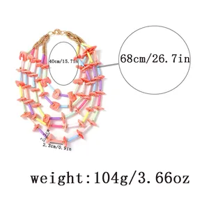 Detail van gelaagde boho kralenketting met maataanduidingen 40cm en 68cm