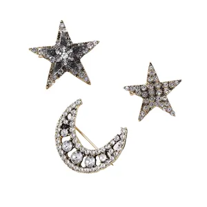 Luxury moon and star brooch set with sparkling crystals in vintage gold finish