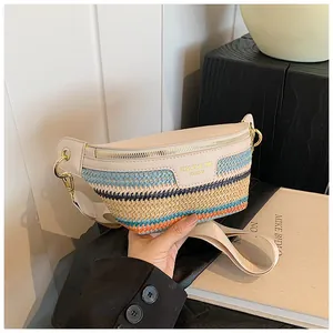 Macro shot of colorful woven texture and premium leather trim on a crossbody chest bag