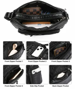 Detail van crossbodytas met meerdere vakken voor georganiseerde opbergruimte