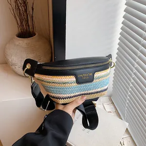 Multicolor woven crossbody chest bag with adjustable black strap and chic leather trim