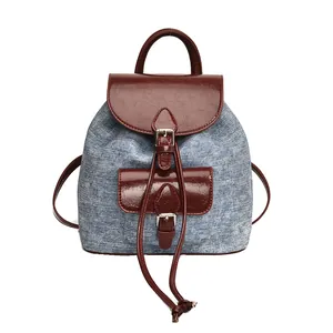 Retro denim and red PU leather patchwork backpack with drawstring closure for women