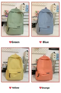 Collage of four minimalist backpacks in green, blue, yellow, and orange nylon fabric