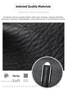 Close-up of black lychee texture leather with waterproof surface and silver metal hardware