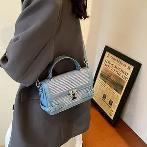 Fashion light blue small square crossbody bag with woven texture and metal lock for women