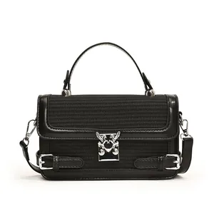 Chic black woven handbag with a silver pegasus buckle and adjustable shoulder strap
