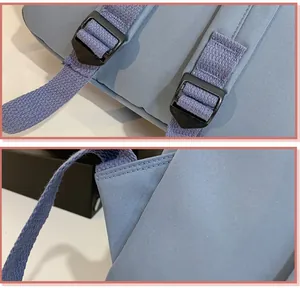 Detail van de versterkte stiksels op de rugzakriem met duurzame kunststof gesp