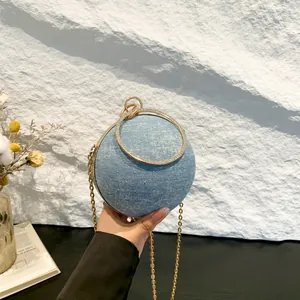 Luxury spherical denim evening bag with sparkling rhinestones and golden ring handle