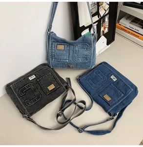 Three colors of denim crossbody bags featuring letter C patches and metal twist locks
