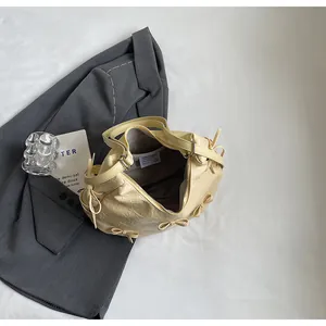 Interior view of cream yellow tote bag showing lining, zip pocket and logo label