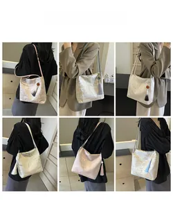 Detailed views of vintage jacquard hobo bag with tassel showing multiple style options