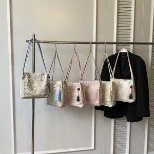 New Chinese style jacquard shoulder bags with elegant floral patterns and silk tassels