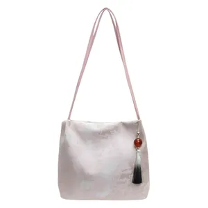 New Chinese style light purple jacquard shoulder bag with elegant tassel detail