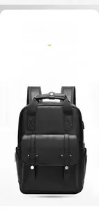 Close-up of the black PU leather backpack showing fine texture and rivet buckle details
