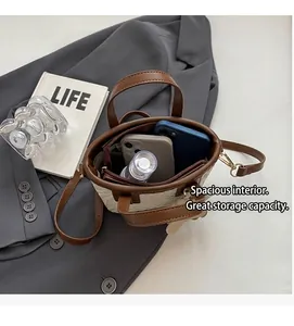 Macro view of woven tote bag interior showing spacious capacity for phone and skincare