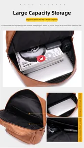 Detail van het schokbestendige laptopcompartiment en interne vakken in de lederen rugzak