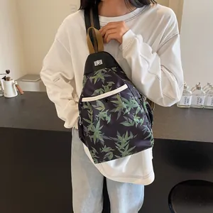 New Chinese style crossbody bag with green bamboo leaf print and silver swivel lock