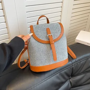 Fashionable grey tweed and brown leather large capacity backpack for casual daily wear