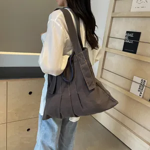 Dark grey pleated canvas tote bag for women with large capacity and stylish design