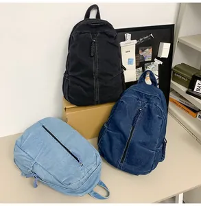 Détails de grands sacs à dos en denim en bleu clair, bleu foncé et noir coloris